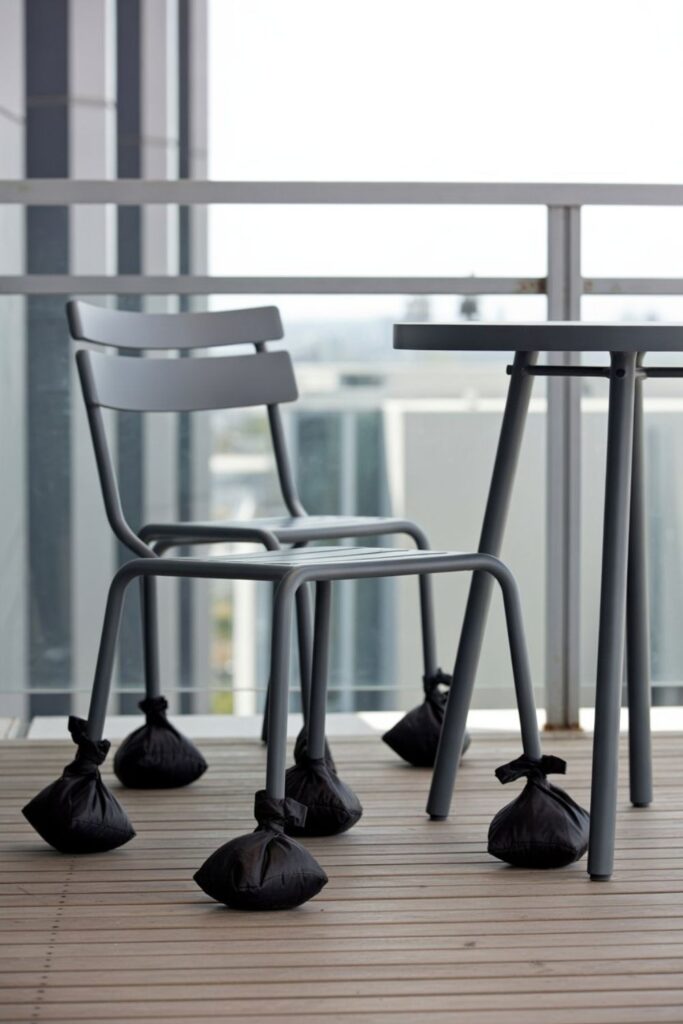 25+ Transform Your Balcony with Small Apartment Patio Ideas 2 How Do You Secure Furniture on Windy Balconies?